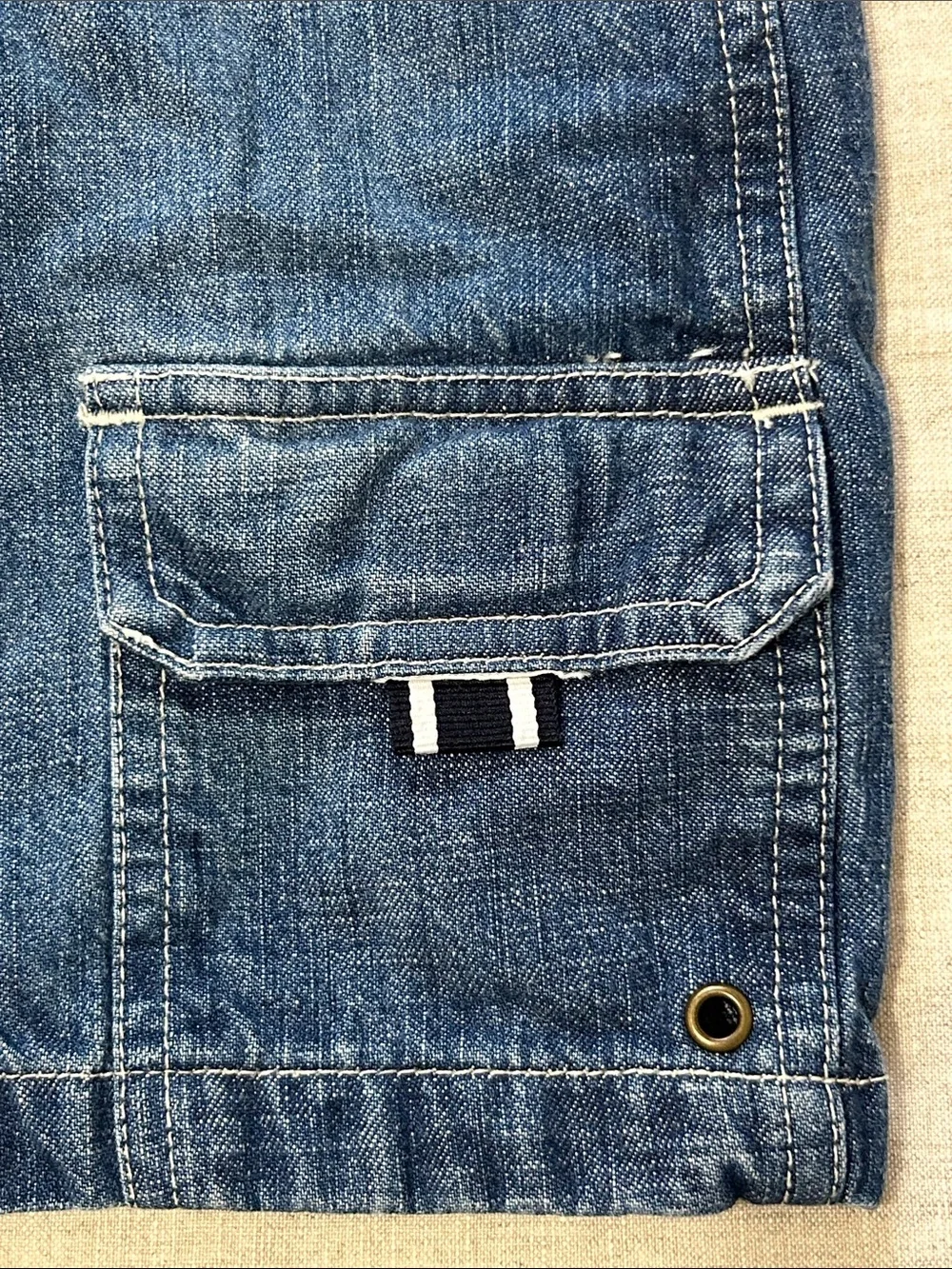 OshKosh B'gosh Dark Blue Denim Short Overalls for Kids. Embroidered baseball.